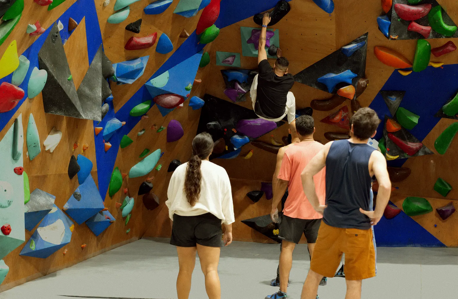 A busy session at the Equilibrium bouldering wall