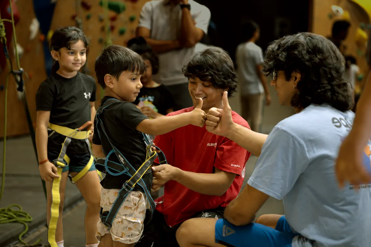 Young kids in the Rock Hoppers climbing class at Equilibrium